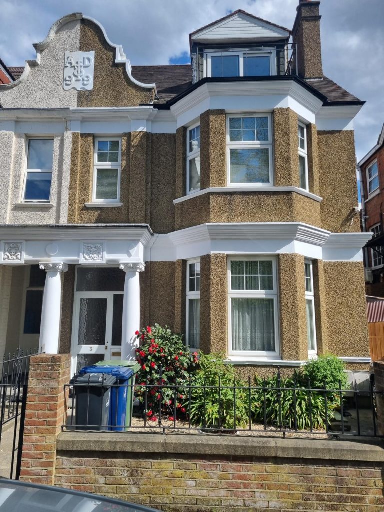 Professional exterior house restoration and painting finish by Loveday Decorators, London.